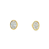 Boucles d'oreilles clous ovales serties or 14 carats