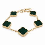 10K yellow gold bracelet with a large black clover charm