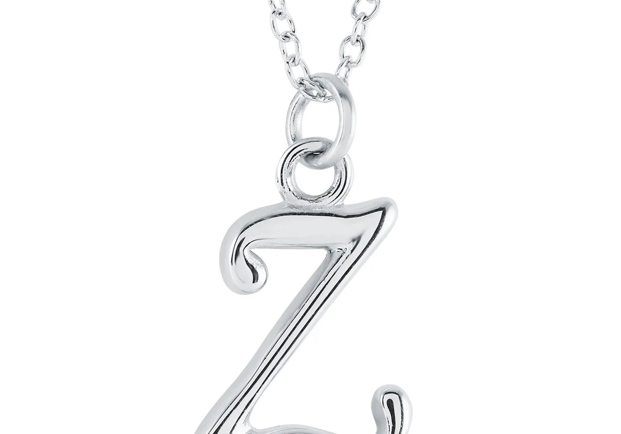 CURSIVE LETTER INITIAL